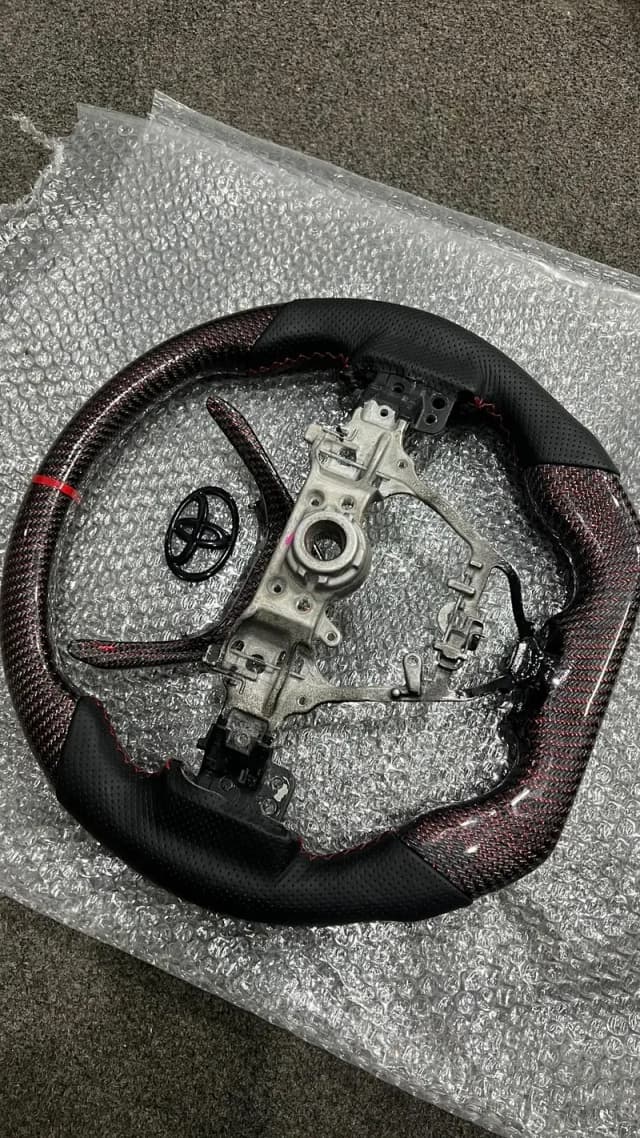 Grande Red Carbon Fiber steering wheel