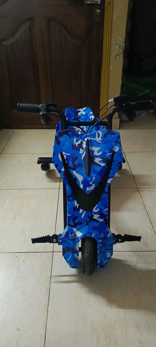 Electric Drift Trike / Scooter (Blue Camo) – Brand New Condition
