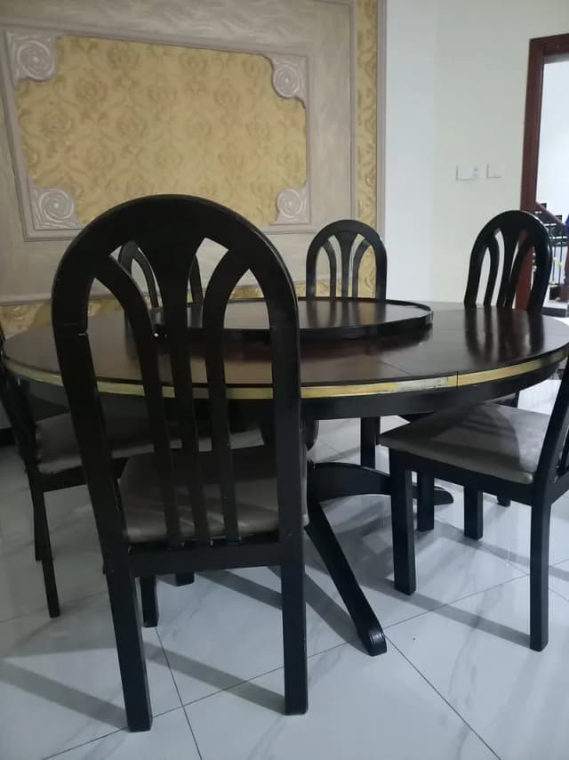 Black teakwood dinning table with chairs