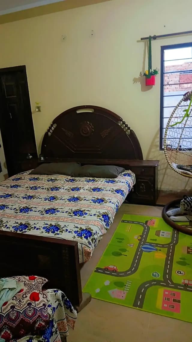 wooden bed with side tables