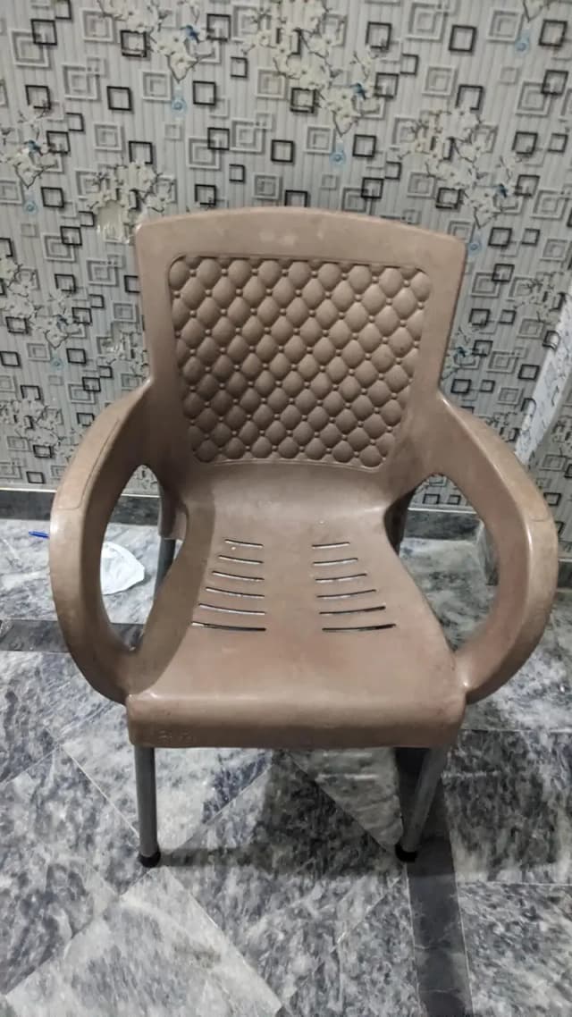 Chair (plastic body & steel legs)