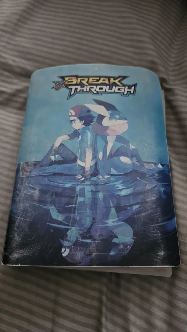Original pokemon card binder with cards original it hold upto 260 card