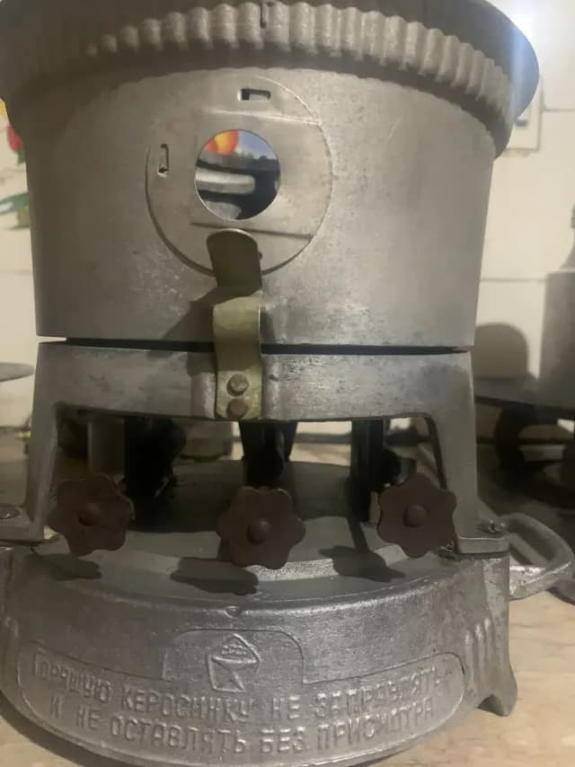 A vintage soviet aluminum stove from 20th century made USSR (3 wick)