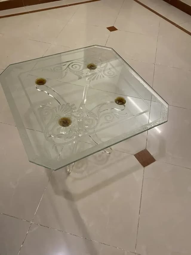 Used glass center table with stylish design- condition 10/10