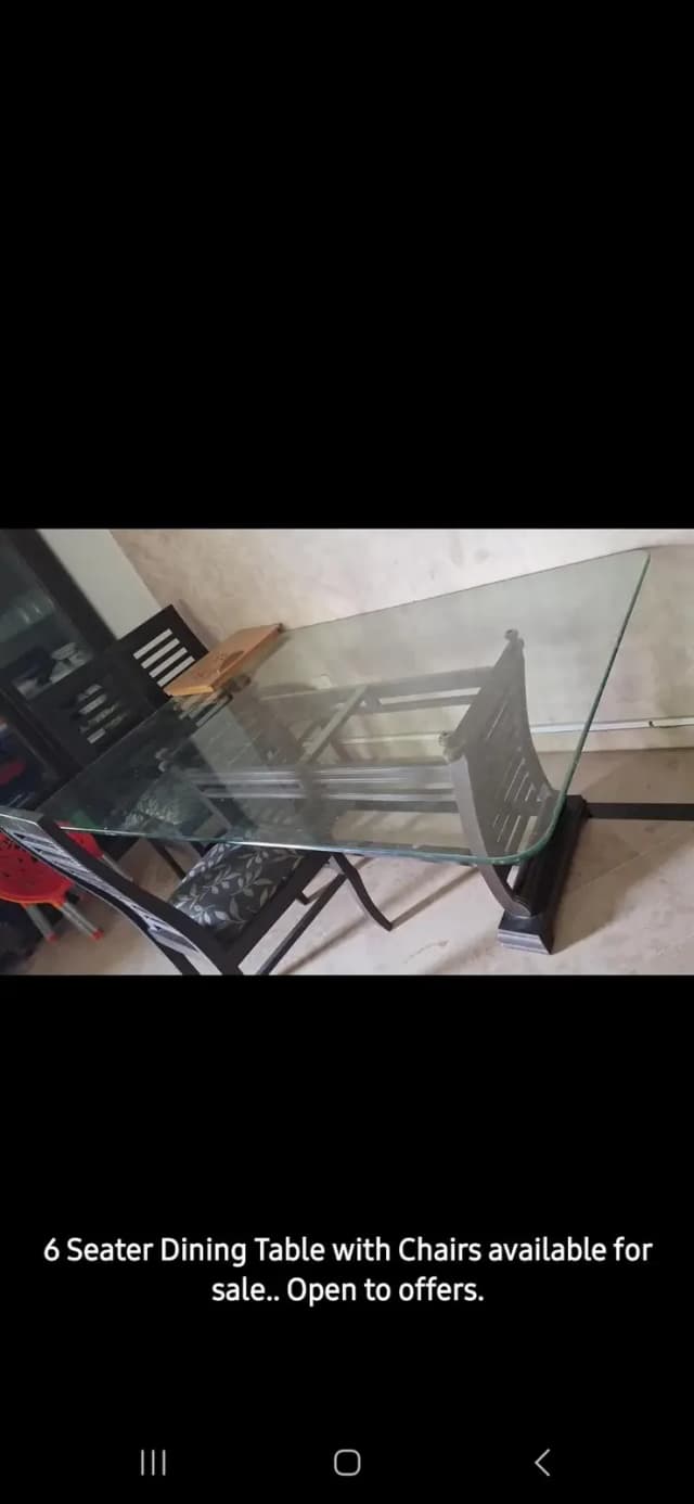 Dining Table + 6 chairs.