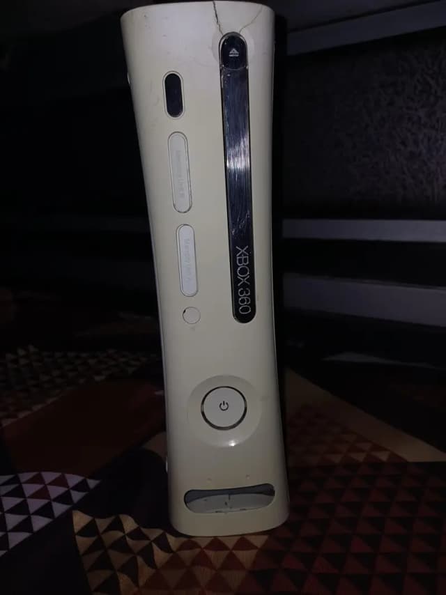 Xbox 360,with 65 games installed.