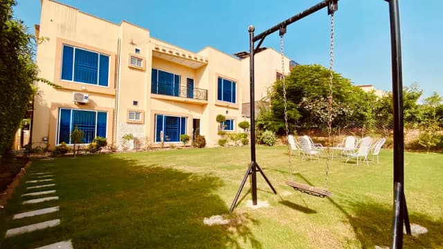 Bahria Town Please 8, 25 Marla House 10 Marla Covered Area And 15 Marla Lawn Furnished House