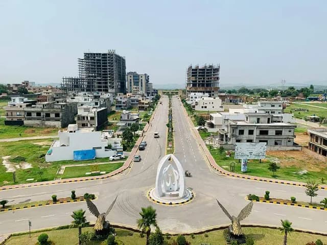 14 Marla Category Double Road plus Corner Top Location Overseas 6 Plot (All Dues Clear With Development Charges Include ) For Sale At Cheapest Rate In Faisal Town Phase 2 One Of The Most Impo
