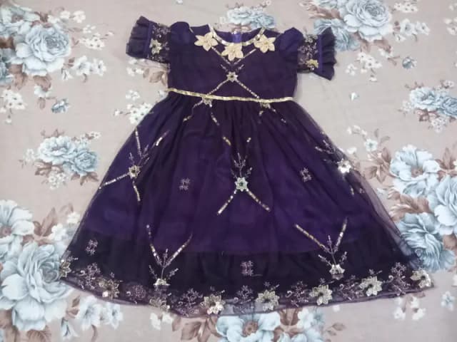 Fancy frock home stitched