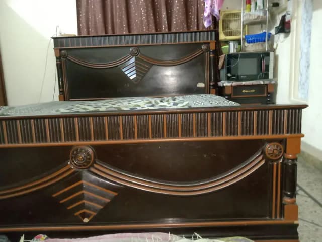 Bed with side tables and storage boxes