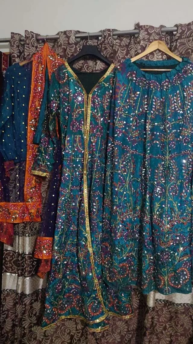Beautiful heavy Maxi along with heavy Lehnga.
