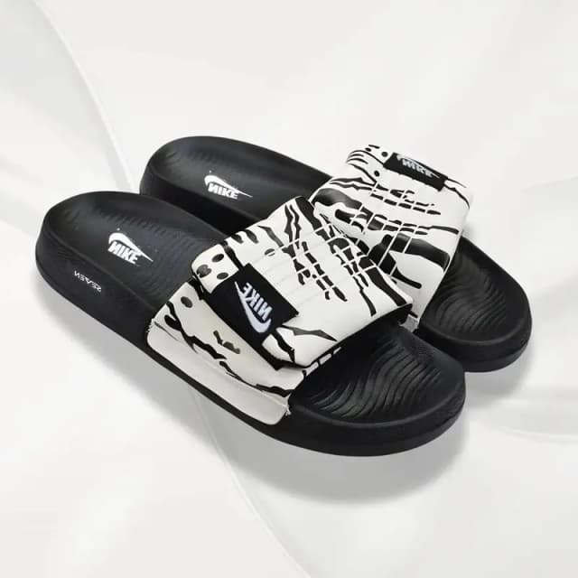 Nike logo slide slipper black white patterned  size 8