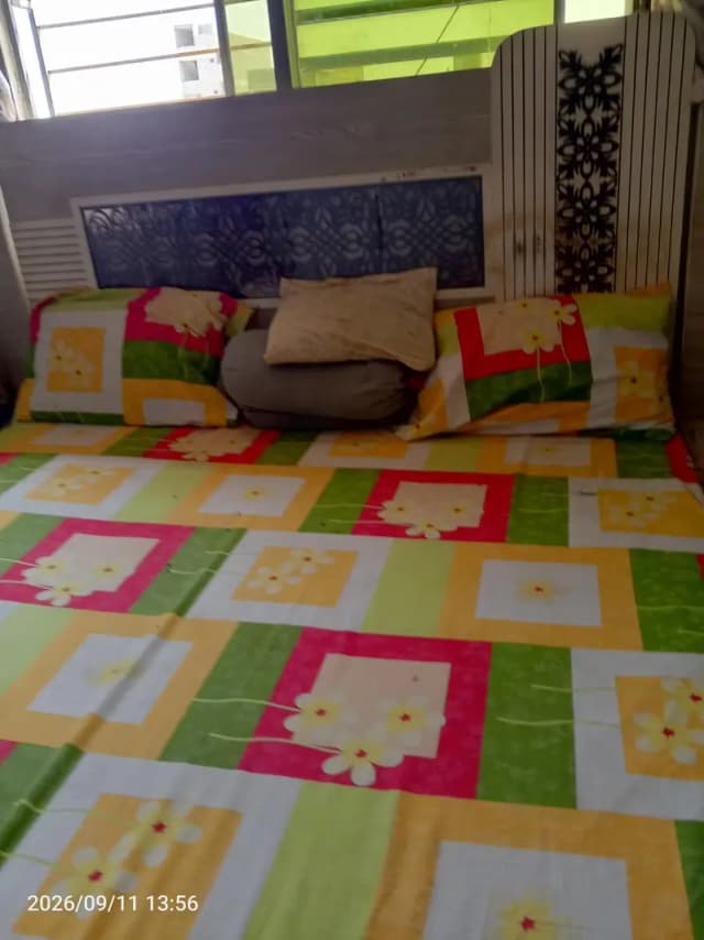 king size bed with 2 side tables and dressing table