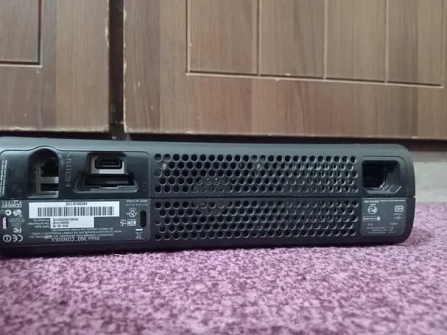Xbox 360 Jasper with [ a controller , power supply , and cables ]