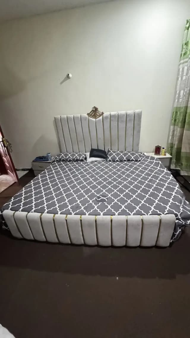 Double bed with two side tables without mattress