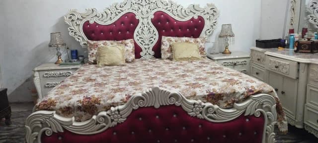 we are selling a velvet wooden bed