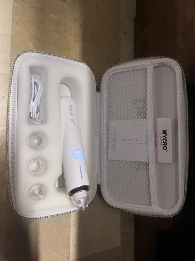 Microdermabrasion device