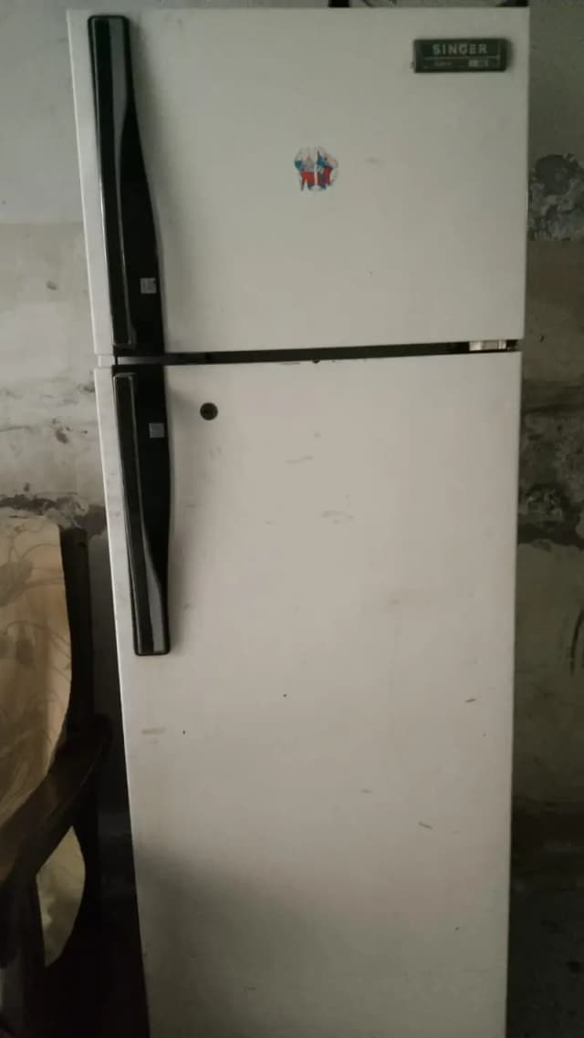 Used mid sized fridge