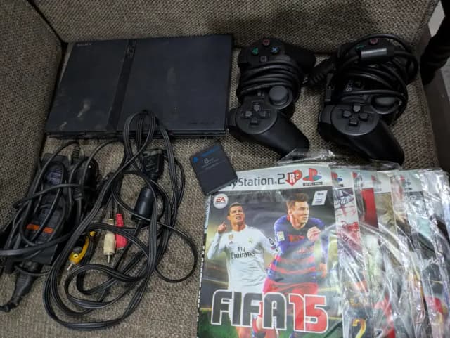 PlayStation 2 Slim with complete bundle for sale