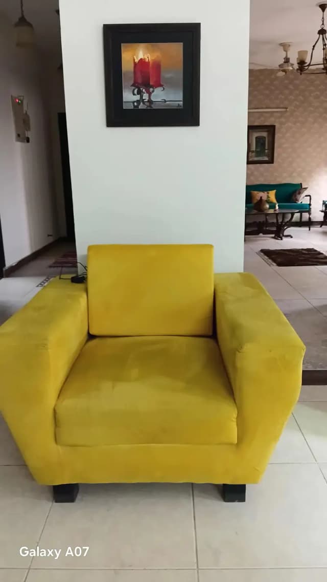 corner sofa and a studio single sofa
