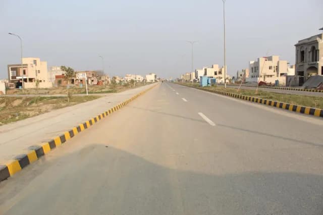 CORNER PAIR ON MAIN 150-FEET WIDE ROAD PLOT # X-1+2 RESIDENTIAL PLOT LOCATED IN THE BEST BLOCK OF DHA LAHORE.
