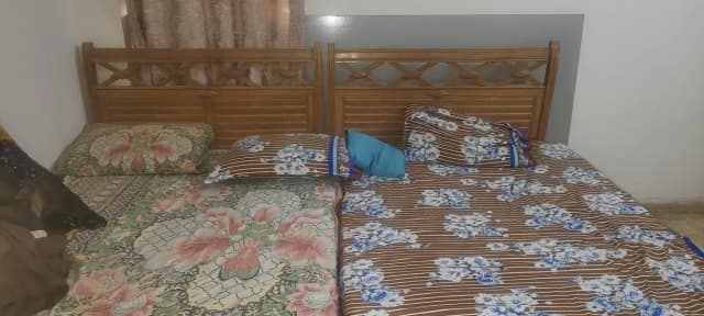 2 Single Wooden Beds in Good Condition.