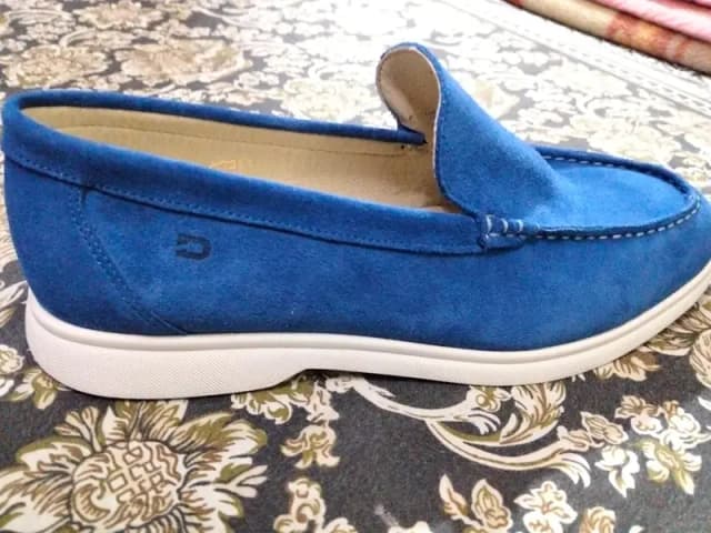 Brand new shoes . . . brand DEAKINS. . . MADE BY PORTUGAL