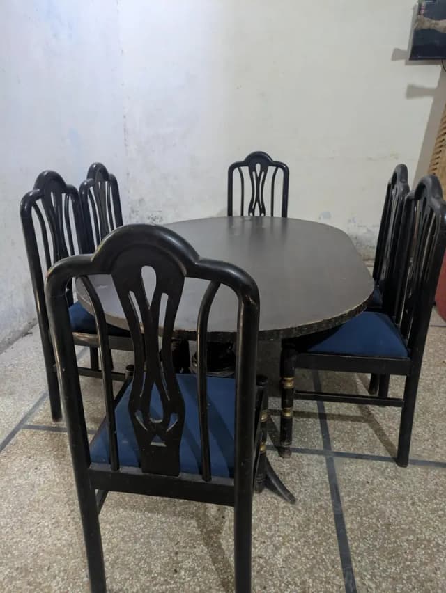 wooden dining table and chairs